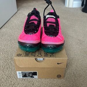 Nike Women’s pink and Black Sneakers